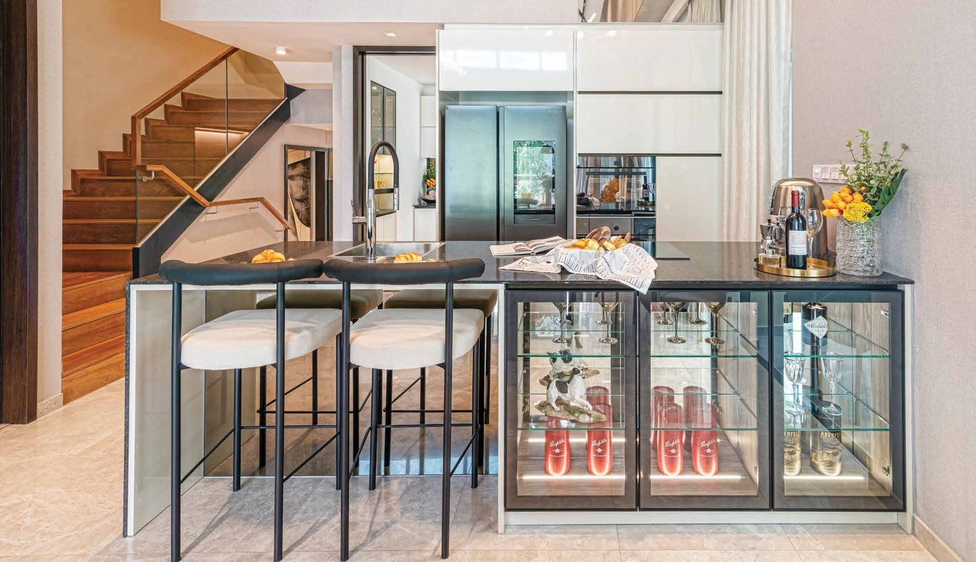 The deluxe kitchen of a Belgravia Ace house with its breakfast counter and the oriental kitchen behind the sliding door, artist's impression
